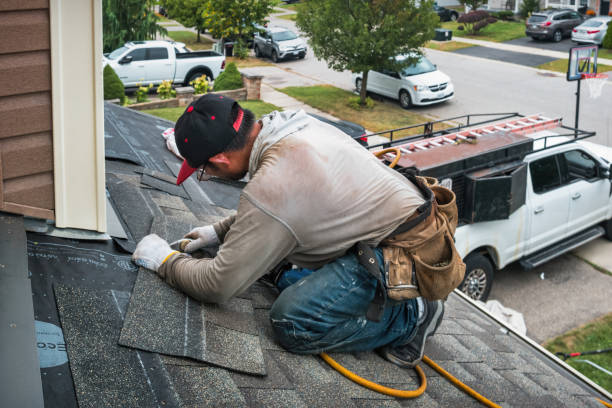 Professional Roofing technician working in Conway, MA